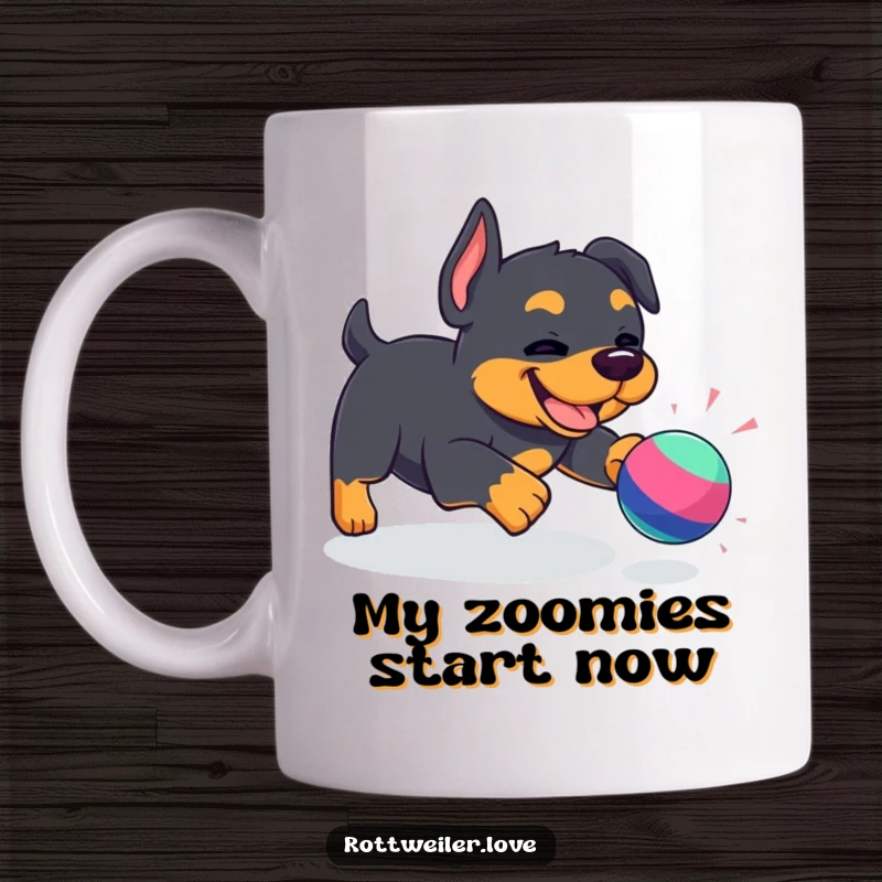 Funny Kawaii Rottweiler mug featuring a happy dog joyfully chasing a bright bouncy toy, showcasing pure canine bliss and playful energy.