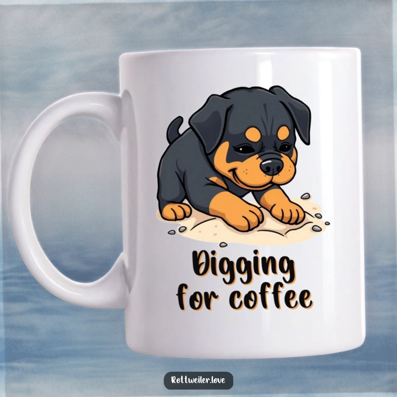 Funny Rottweiler mug featuring a happy dog playfully digging with its paws in a patch of soft sand.