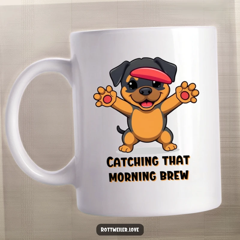 Funny Rottweiler Mug showing an athletic dog with paws outstretched, eagerly anticipating catching a frisbee.