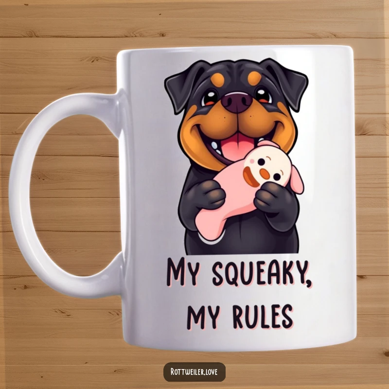 Funny Rottweiler mug showing a dog with a huge smile enthusiastically holding a squeaky toy, radiating pure happiness and playful energy.
