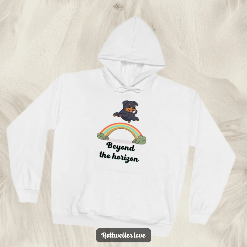 Funny Rottweiler dog leaping over a rainbow bridge, showing heartwarming pet memorial humor in this cozy hoodie.