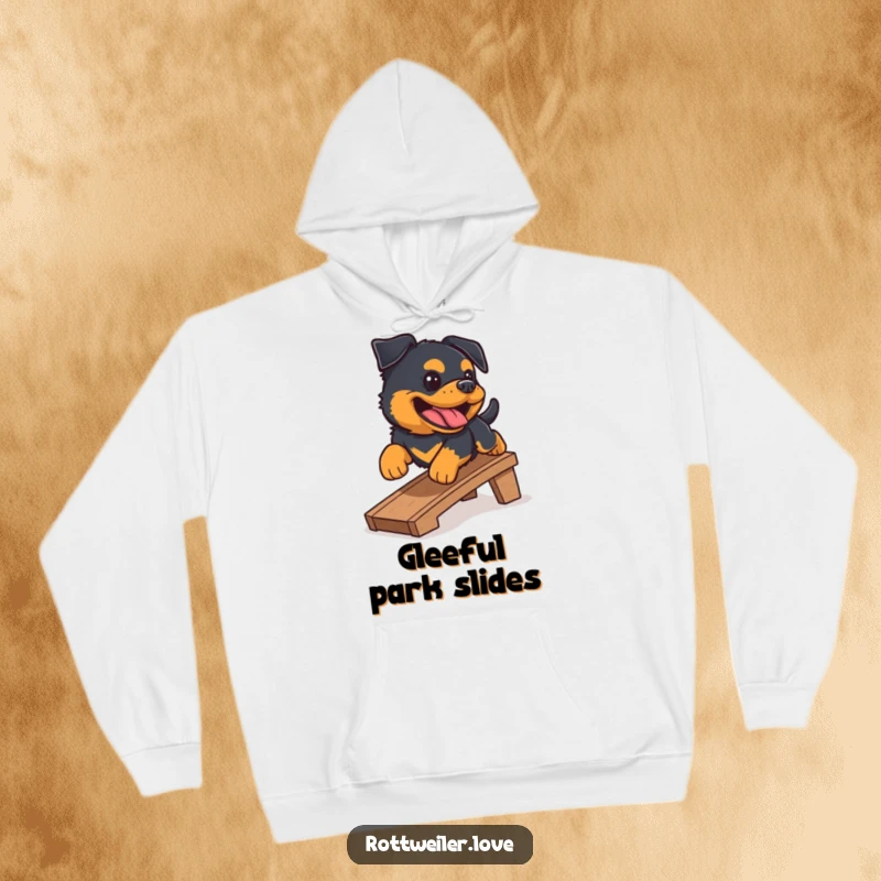 Funny Rottweiler hoodie showing a happy Rottweiler mid-slide down a small ramp, mid-bark. Soft and warm fleece material.