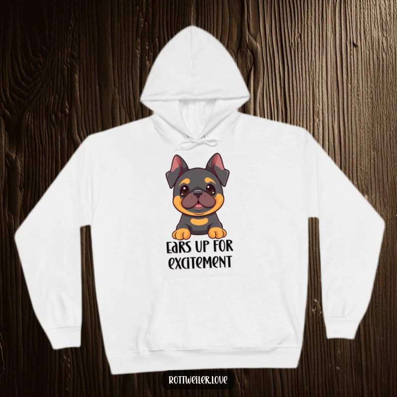 Funny Kawaii Rottweiler hoodie showcasing a dog with perked ears, looking intently at something fun, embodying curiosity and readiness.