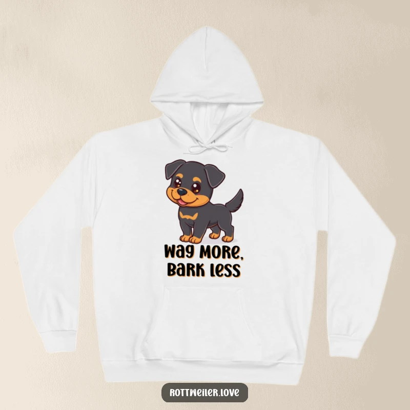Funny Rottweiler Hoodie depicting a cheerful dog with bright eyes and a happily wagging tail, offering comfort and humor.