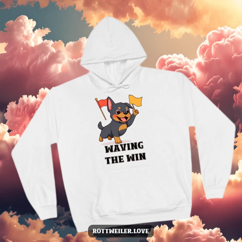 Funny Rottweiler hoodie displaying an energetic dog proudly waving a small, bright flag, radiating enthusiasm and joy.