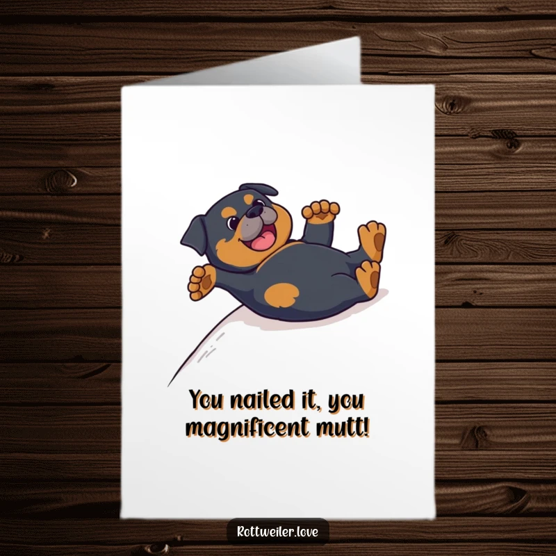Funny Free Printable Congratulations Card: A happy Rottweiler slides on its back, paws in the air, celebrating success.