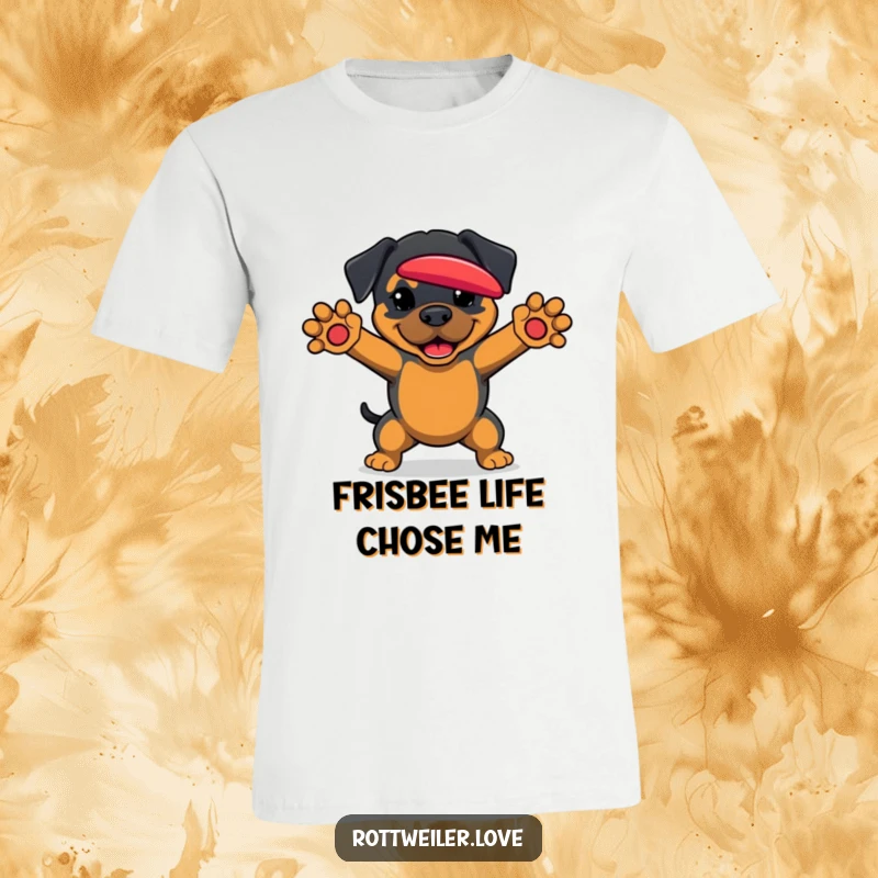 Funny Rottweiler T-Shirt featuring a dog with paws ready to catch a frisbee, showcasing athleticism and fun.