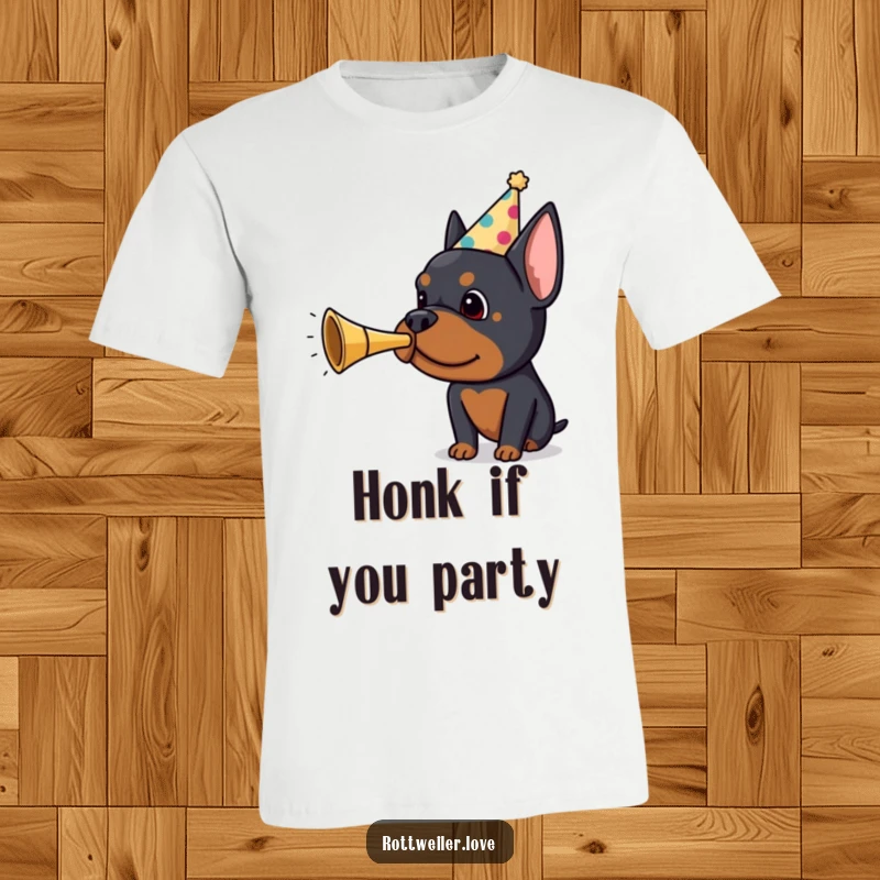 Funny Rottweiler party t-shirt featuring a joyful dog in a hat enthusiastically blowing a tiny party horn, embodying pure celebration.