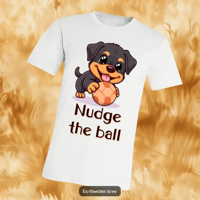 Funny Rottweiler t-shirt featuring a dog with happy eyes playfully nudging a rolling ball, perfect for expressing a sweet and playful personality.