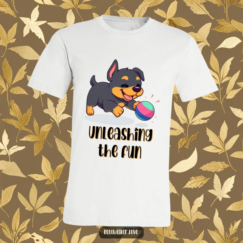 Funny Kawaii Rottweiler t-shirt showcasing a cute dog gleefully pursuing a vibrant toy, illustrating boundless energy and infectious happiness.