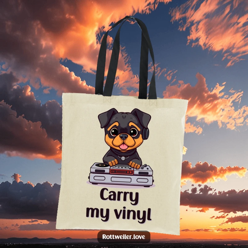 Funny Rottweiler DJ tote bag with a Rottweiler behind tiny turntables, ready to mix. Durable canvas for music essentials.