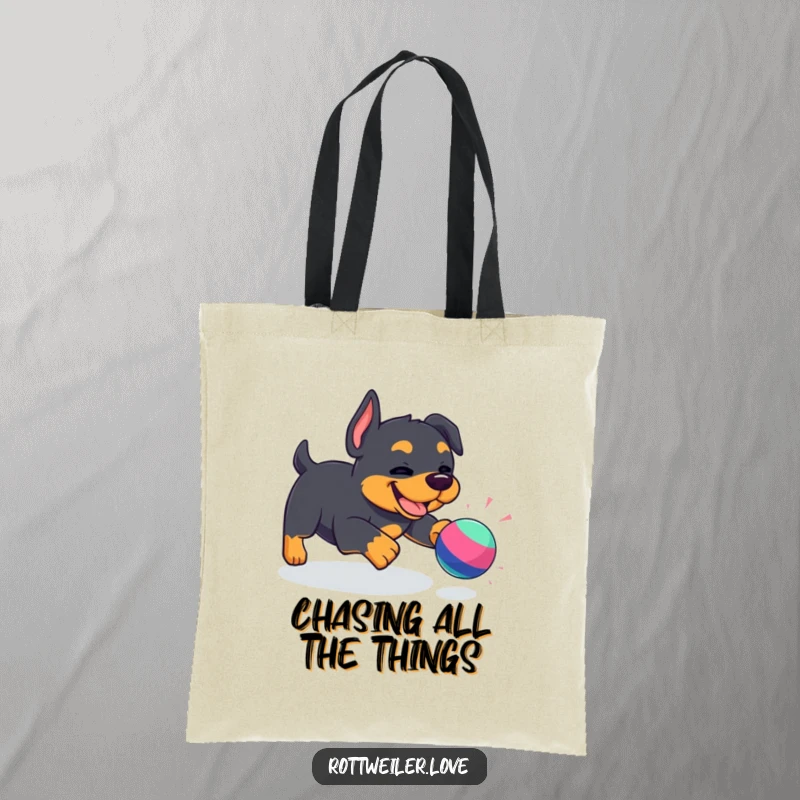 Funny Kawaii Rottweiler tote bag depicting a happy dog in pursuit of a toy, highlighting playful action and cheerful canine spirit.